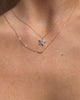 The Pave Star Charm Necklace is the top necklace