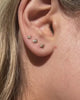 The Pear Bezel Studs are the second earring