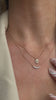The Geo-Bezel Pear Charm Necklace is the top necklace
